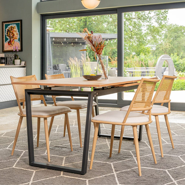 Belluno Extending Dining Table Set with 4 PE Rattan Chairs