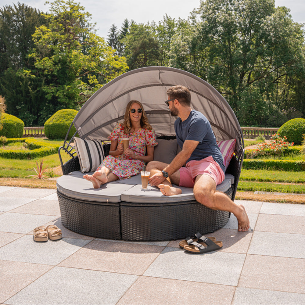 Camrose Rattan Garden Furniture Day Bed With Lift Up Table in Black