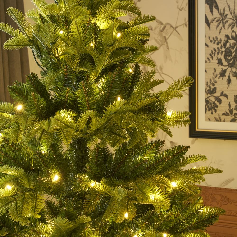 Pre-Lit Green Calgary Artificial Christmas Tree With Quick Pole And Skirt Option