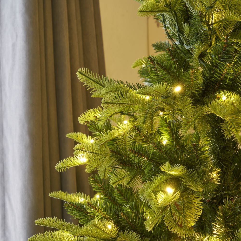 Pre-Lit Green Calgary Artificial Christmas Tree With Quick Pole And Skirt Option